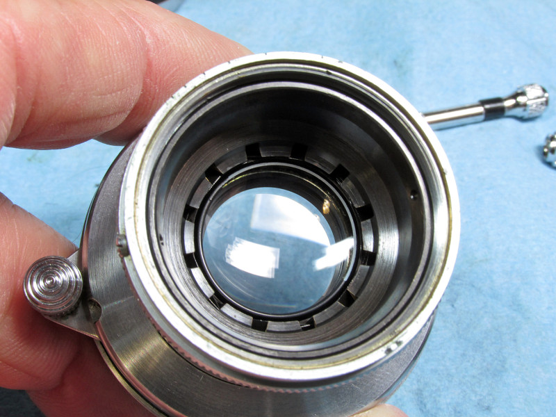 here is the aperture blade unit ij the lens tube. I cleaned this lens behind it with isop. alcohol